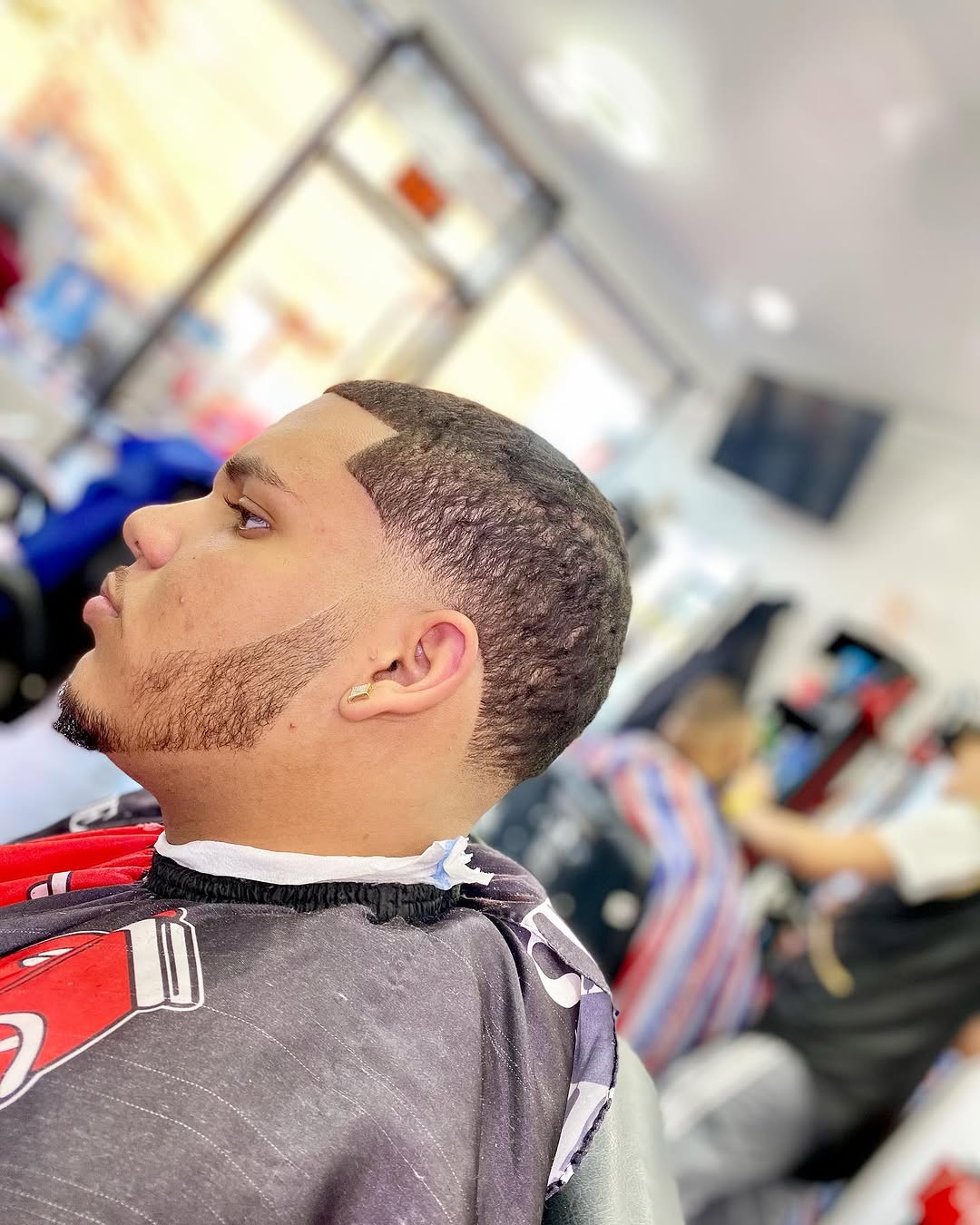 Sharp lineup and fade at Authentic Cutz Barbershop